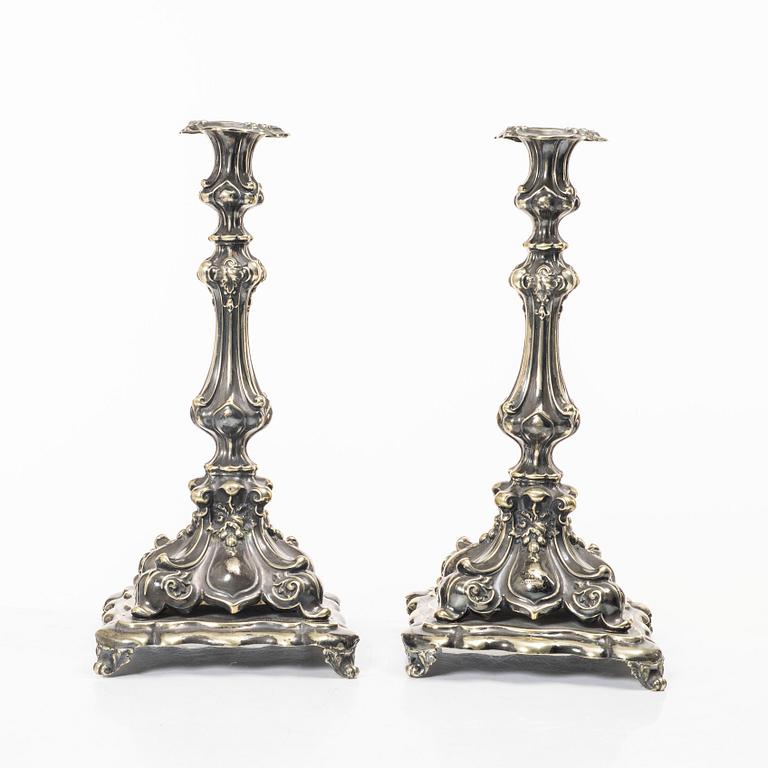 A pair of silver plated Rococo style candelabra, 20th century.