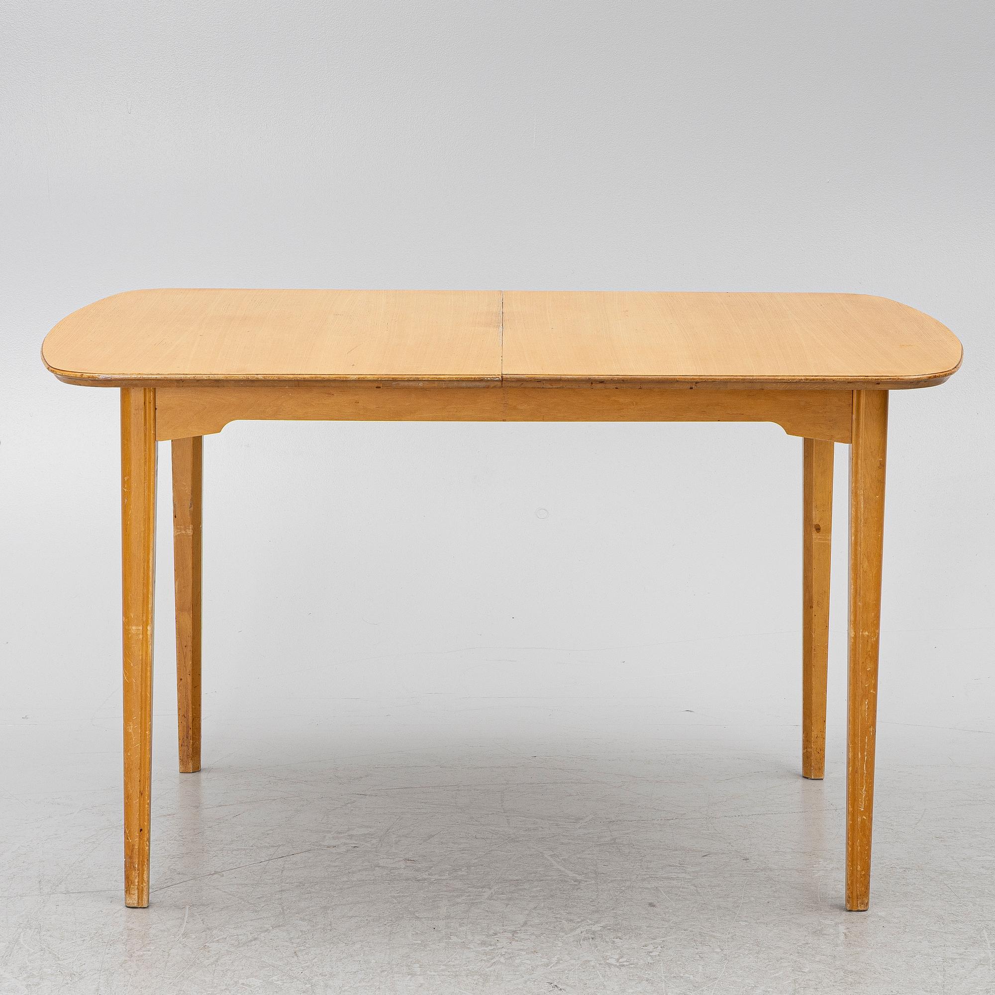 A dining table with six chairs, Sweden, 1940's.