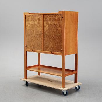 A model 2135 cabinet by Josef Frank for Firma Svenskt Tenn.