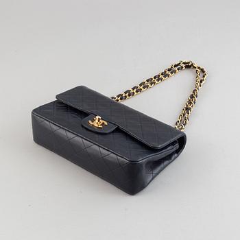 Chanel, a navy leather 'Double Flap Bag', 1989-91.