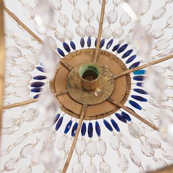 A late Gustavian gilt brass and cut glass thirteen-light chandelier, circa 1800.