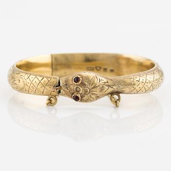 Bangle in the shape of a snake, 18K gold with garnets as eyes, Johan Gustaf Kihlberg, Nyköping 1863.