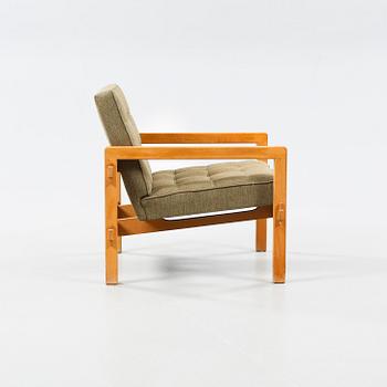 An armchair named "Stugo", designed by Reino Ruokolainen for Futura Möbler AB in Tibro.