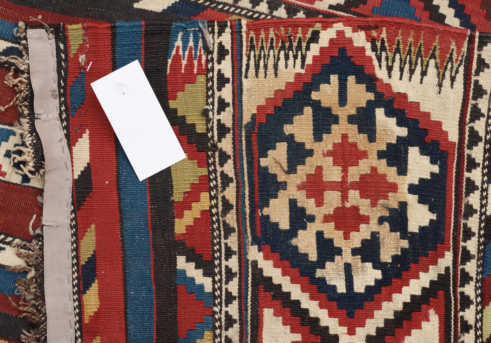 SEMI-ANTIQUE CAUCASIAN KILIM, probably Shirvan. 256 x 156,5 cm.