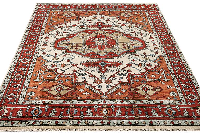 An oriental carpet, c. 296 x 238 cm.