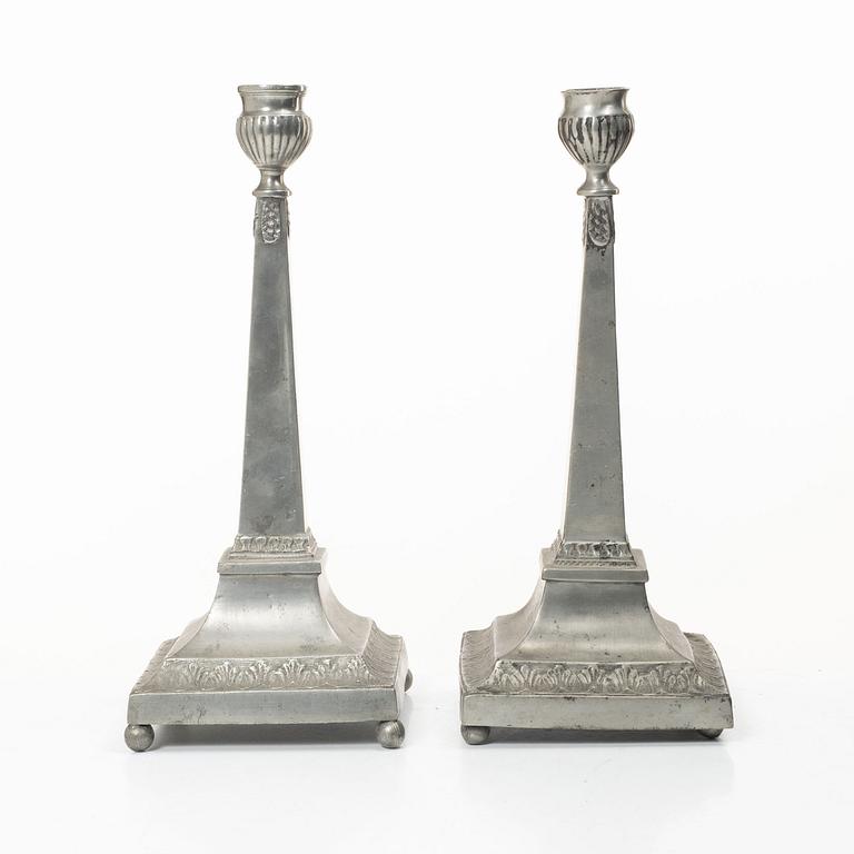 A pair of peuter candlesticks by Petter Höijer, Örebro (1796-1819).