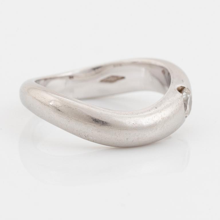 Platinum and brilliant cut diamond ring.