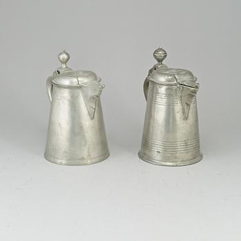 Two pewter tankards, one by Carl Petter Eckerström, Västerås 1833.