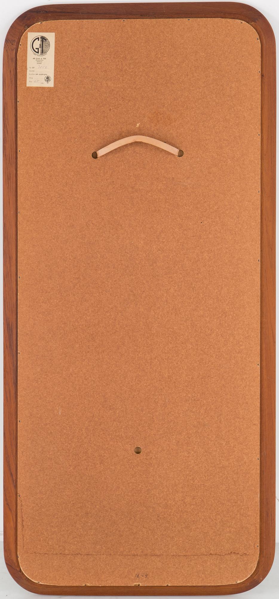 A mid 20th century mirror by G&T.