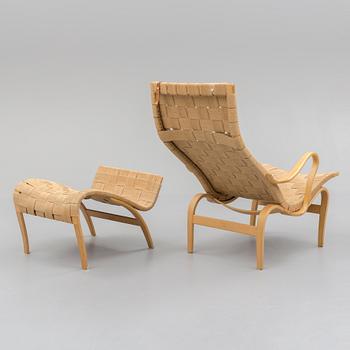 A 'Pernilla' easy chair and foot stool, Bruno Mathsson,  1967.