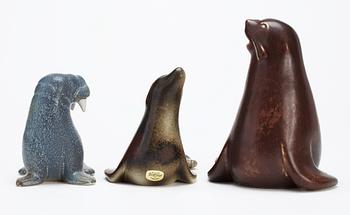 Three Gunnar Nylund stoneware figures, two seals and a walrus, Rörstrand.