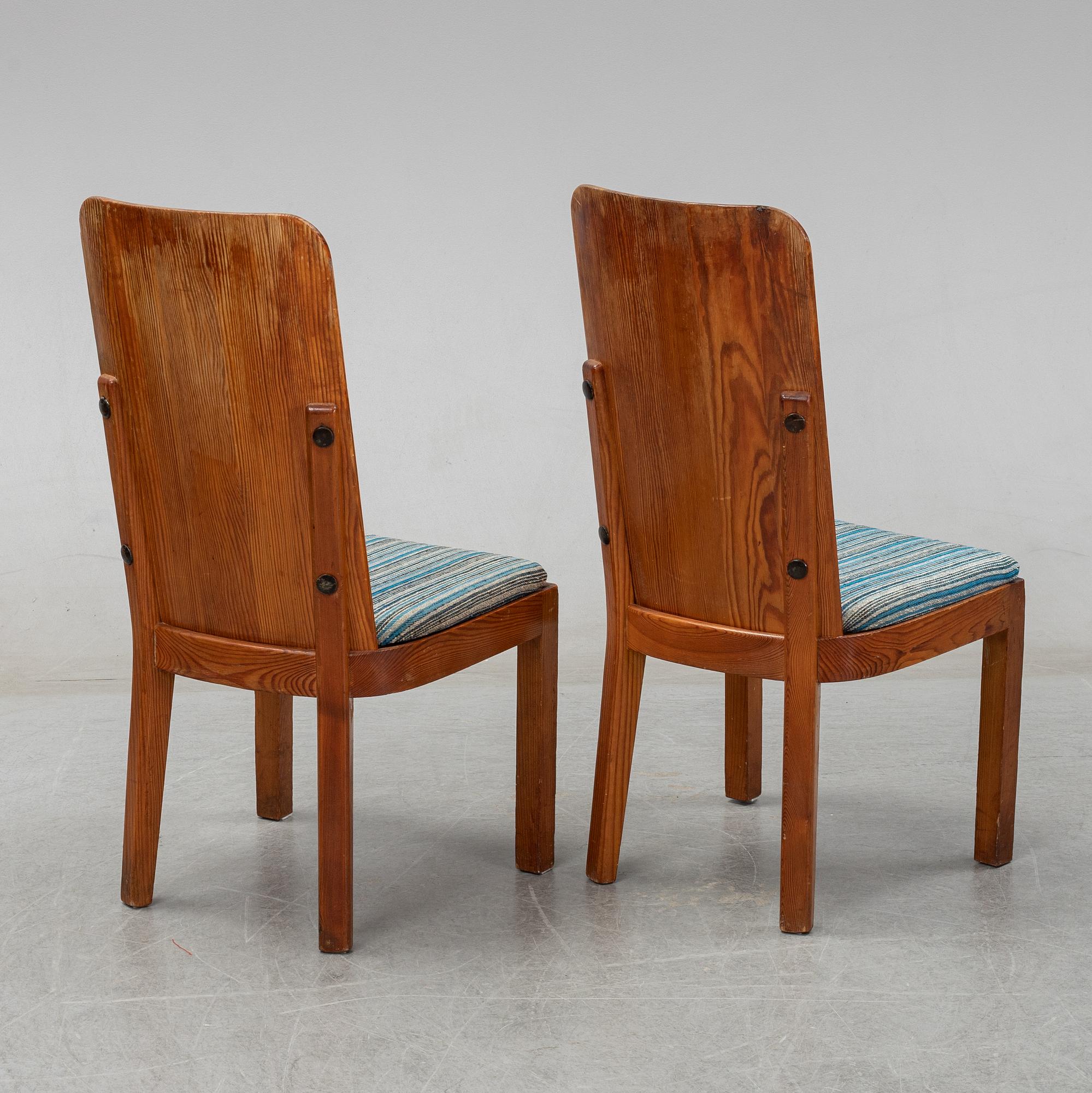 Axel Einar Hjorth, a pair of stained pine "Lovö" chairs, Nordiska Kompaniet, Sweden 1930's.