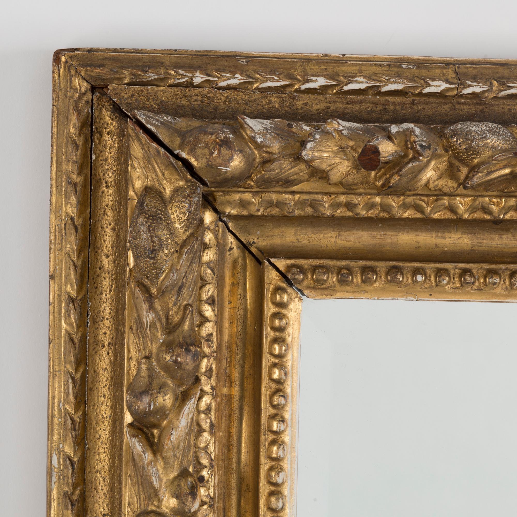 A Baroque style mirror, 19th Century.