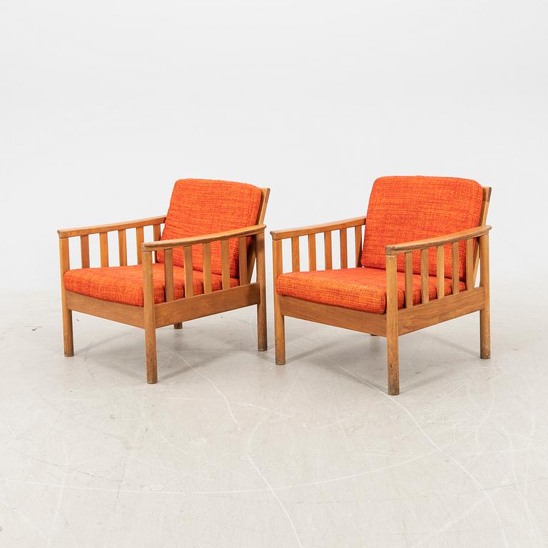 An oak easy chair ans sofa "Tiveden" by Gunnar Myrstrand & Sven Engström from the middle of the 20th century.