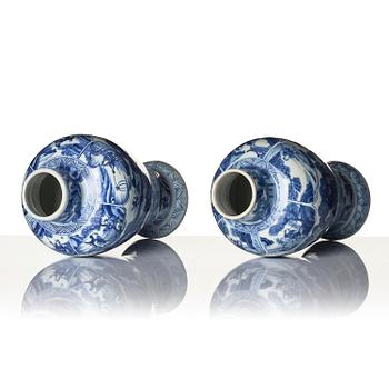 A pair of blue and white 'landscape' vases, Qing dynasty, Kangxi (1662-1722).