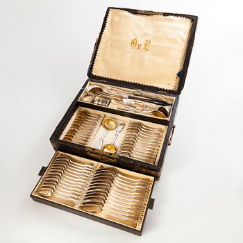 A chest of mainly Russian silverware, 60 pcs, also Sazikov and Ovchinnikov. 19th Century.