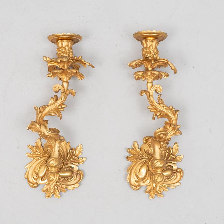 A pair of Louis XV sconces, early 20th century.