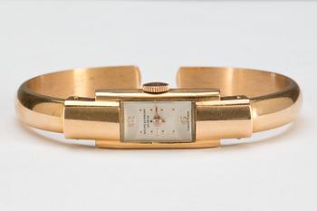 DAMARMBANDSUR, 18 k guld, Baume & Mercier. Vikt ca 16 g.