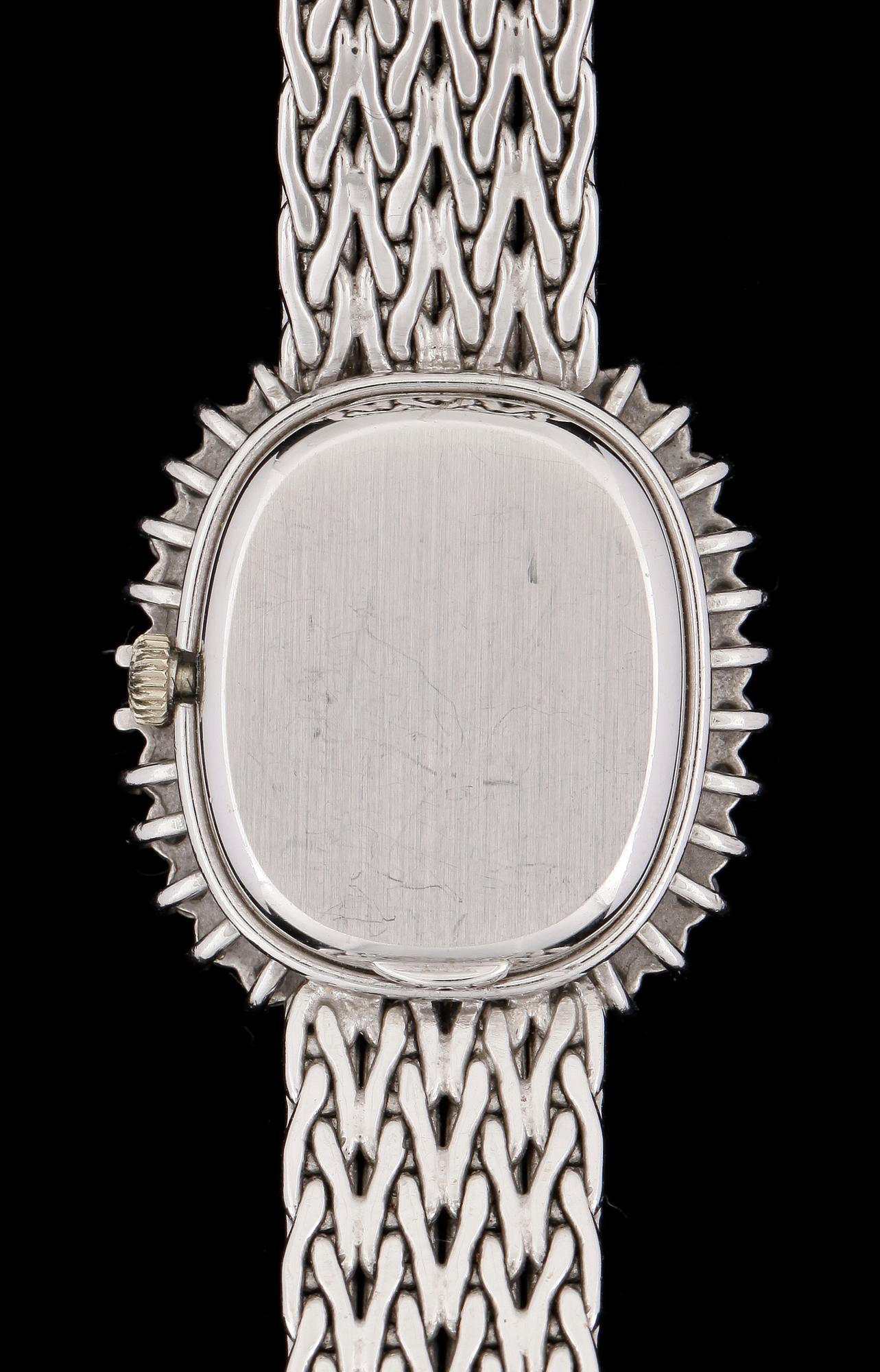 ARMBANDSUR, dam, Tissot, manuell, 18k vitguld, krans med briljantslipade diamanter tot ca0,68ct. Vikt 34g.