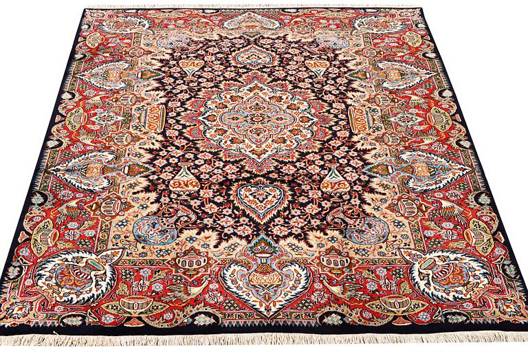 A Kashmar carpet, a. 300 x 200 cm.