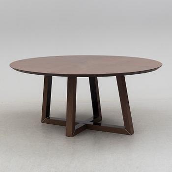 A circa 2000 dining table by Natuzzi, Italy.