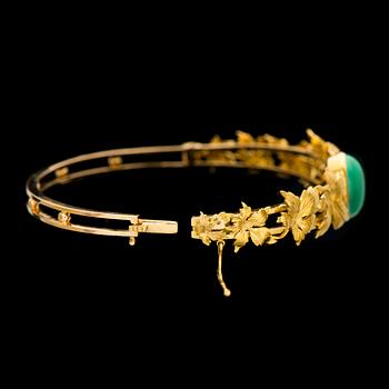 ARMRING, cabochonslipad malakit, 18K guld. A. Tillander 1947.