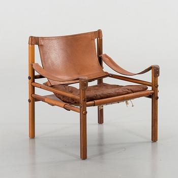 AN ARNE NORELL"SIROCCO" CHAIR.