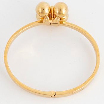 ARMRING, 18K guld med briljantslipad diamant, Design Relo Luzern.