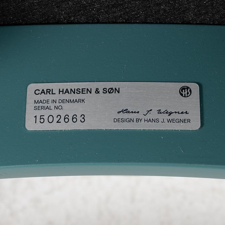 Hans J. Wegner, a set of three "CH-20" dining chairs, Carl Hansen & Son, Denmark 21st century.