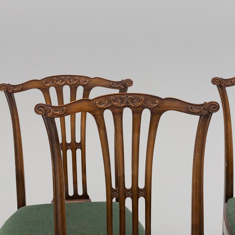 A late 20th century 10 piece Chippendale dining group.
