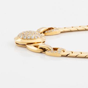 A Cartier 18K gold necklace set with round brilliant-cut diamonds.