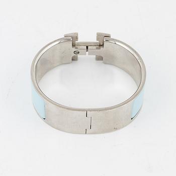 Hermès, a 'Clic Clac H' bracelet.