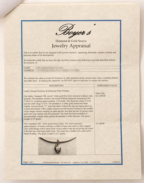 14K white gold solitaire diamond pendant.