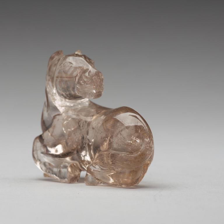 A quartz carving of a reclining horse, China.