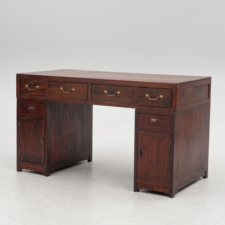 A Chinese hardwood desk, 20th century.