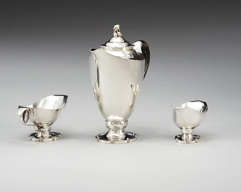 A Georg Jensen three pieces of 830/1000 silver coffee service, Copenhagen 1919-20.