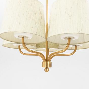 A 1960s Luxus brass ceiling pendant.
