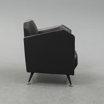 A 'Hotel 21' easy chair by Javier Mariscal for Moroso designed 1995.