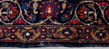 A carpet, an antique/a semi-antique Yezd, ca 557-562 x 366,5-370,5 cm.