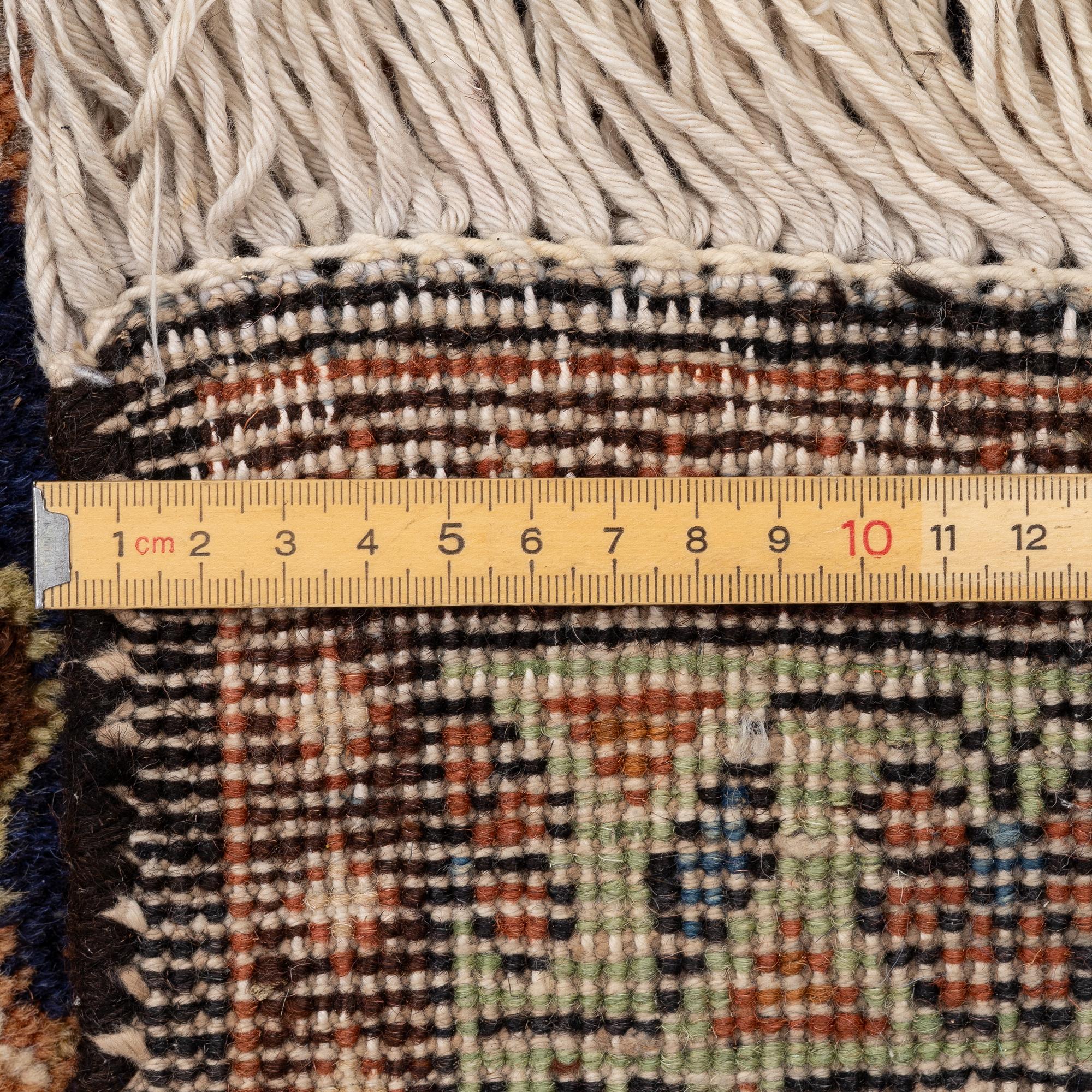 Rug, approximately 320 x 240 cm.