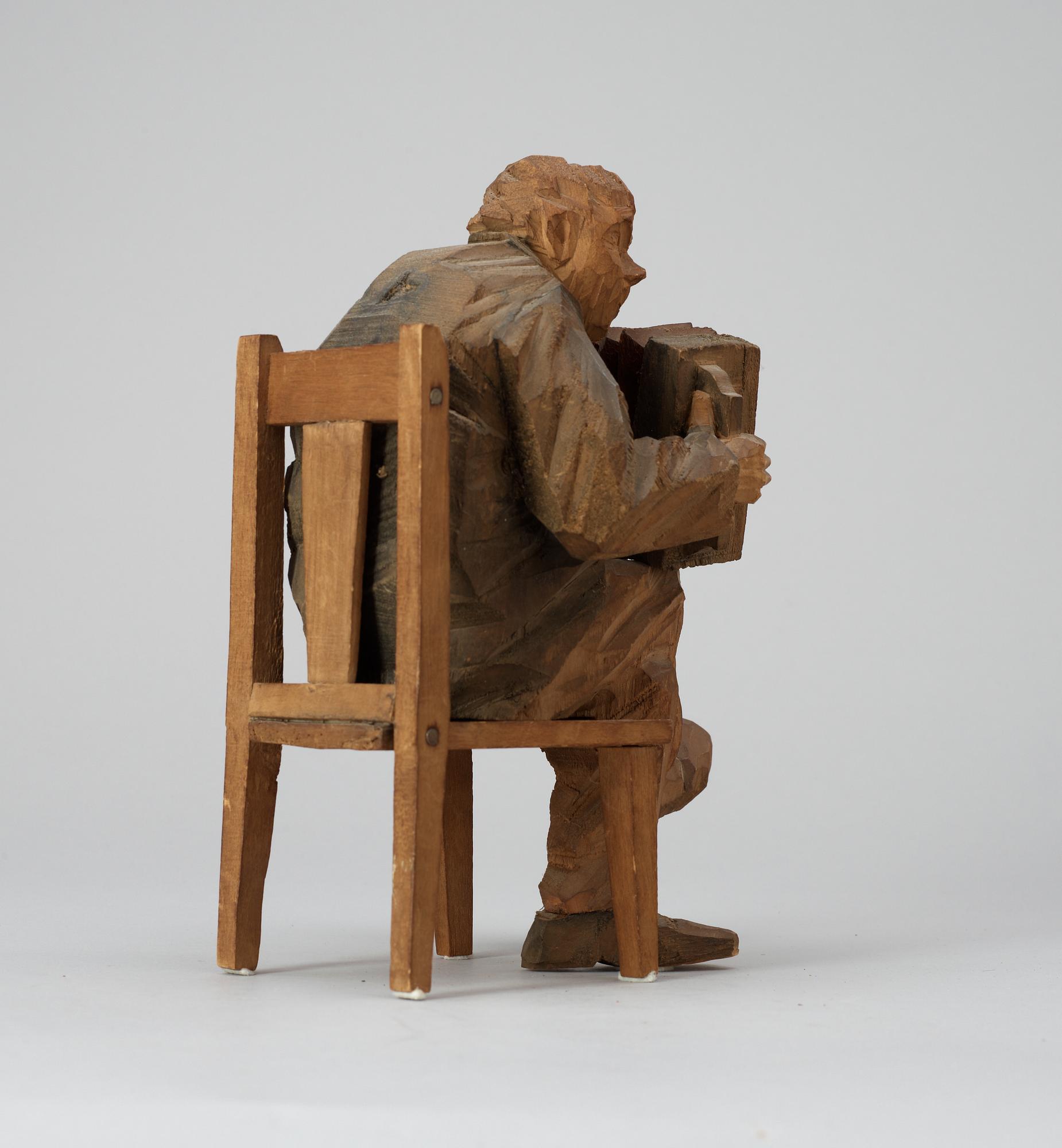 Axel Petersson Döderhultarn, Sittande dragspelare.