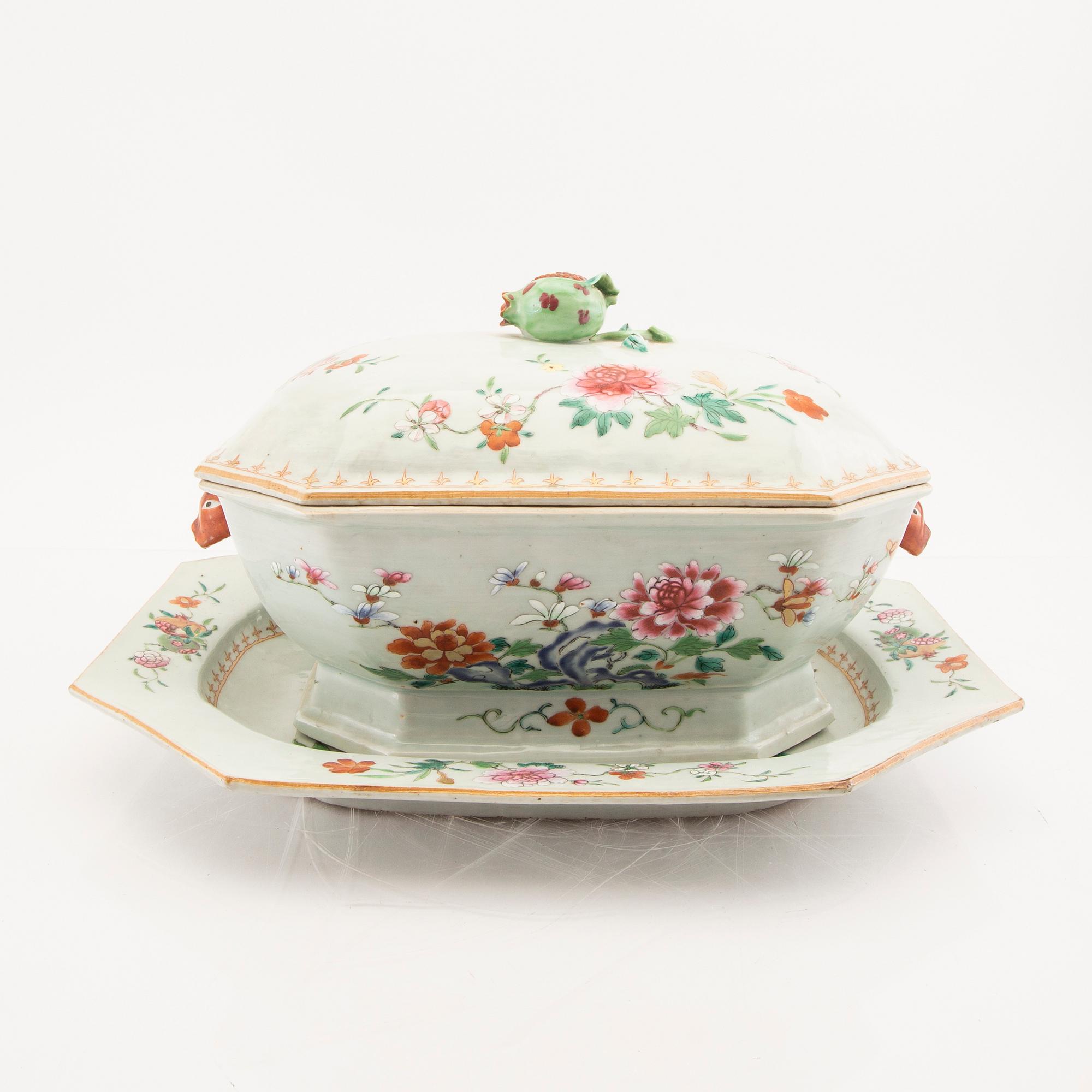 A Chinese famille rose tureen with cover and plate later part of the 18th century.