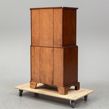A mahogany 'Tallboy' chest of drawers.