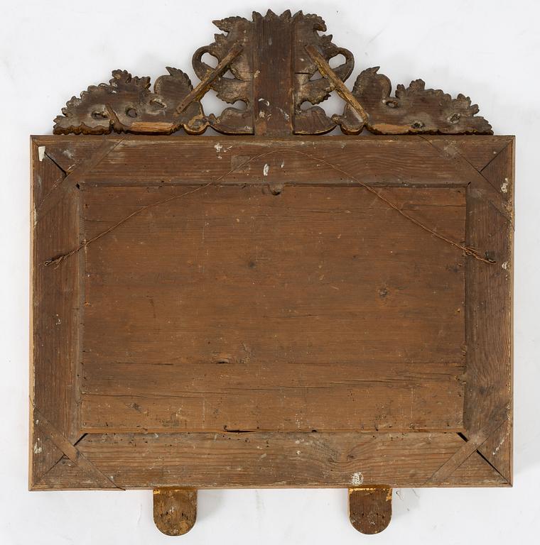 A pair of Late Empire gilded mirror sconces for two candles, Gothenburg, 1830s-40s.