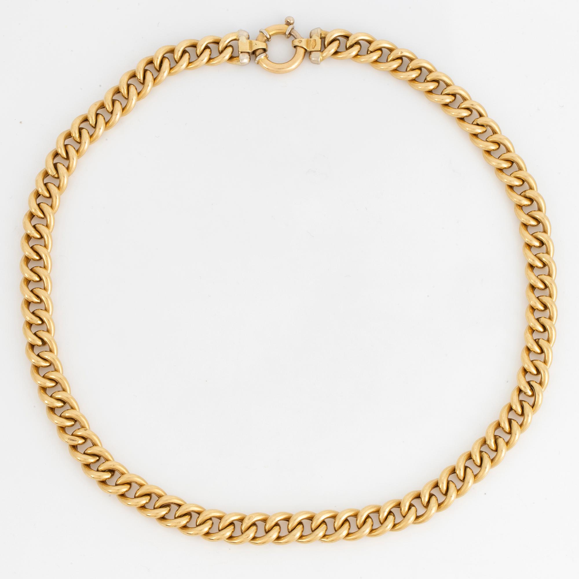 18K gold curb link necklace.