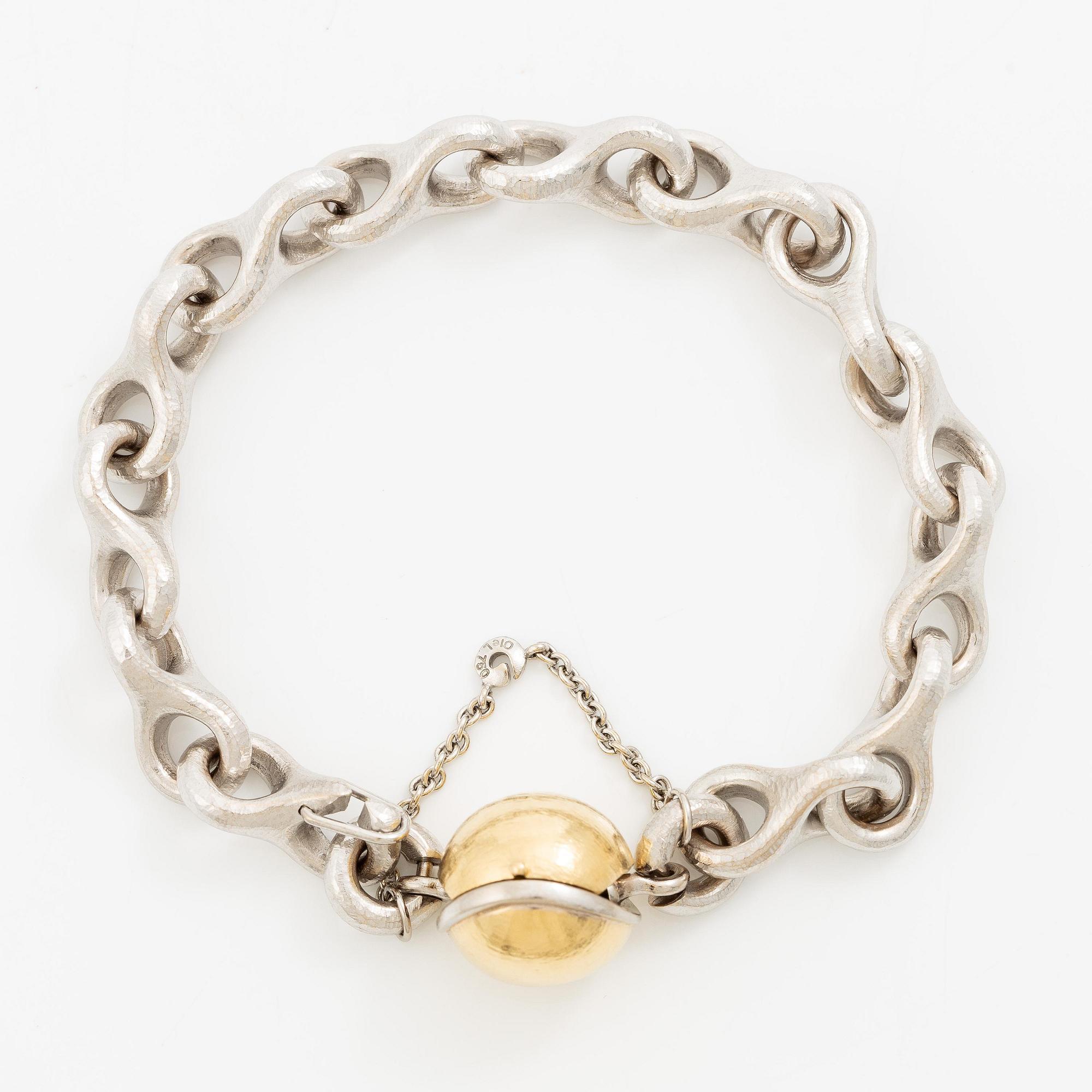 Ole Lynggaard armband 18K vitguld med kullås.