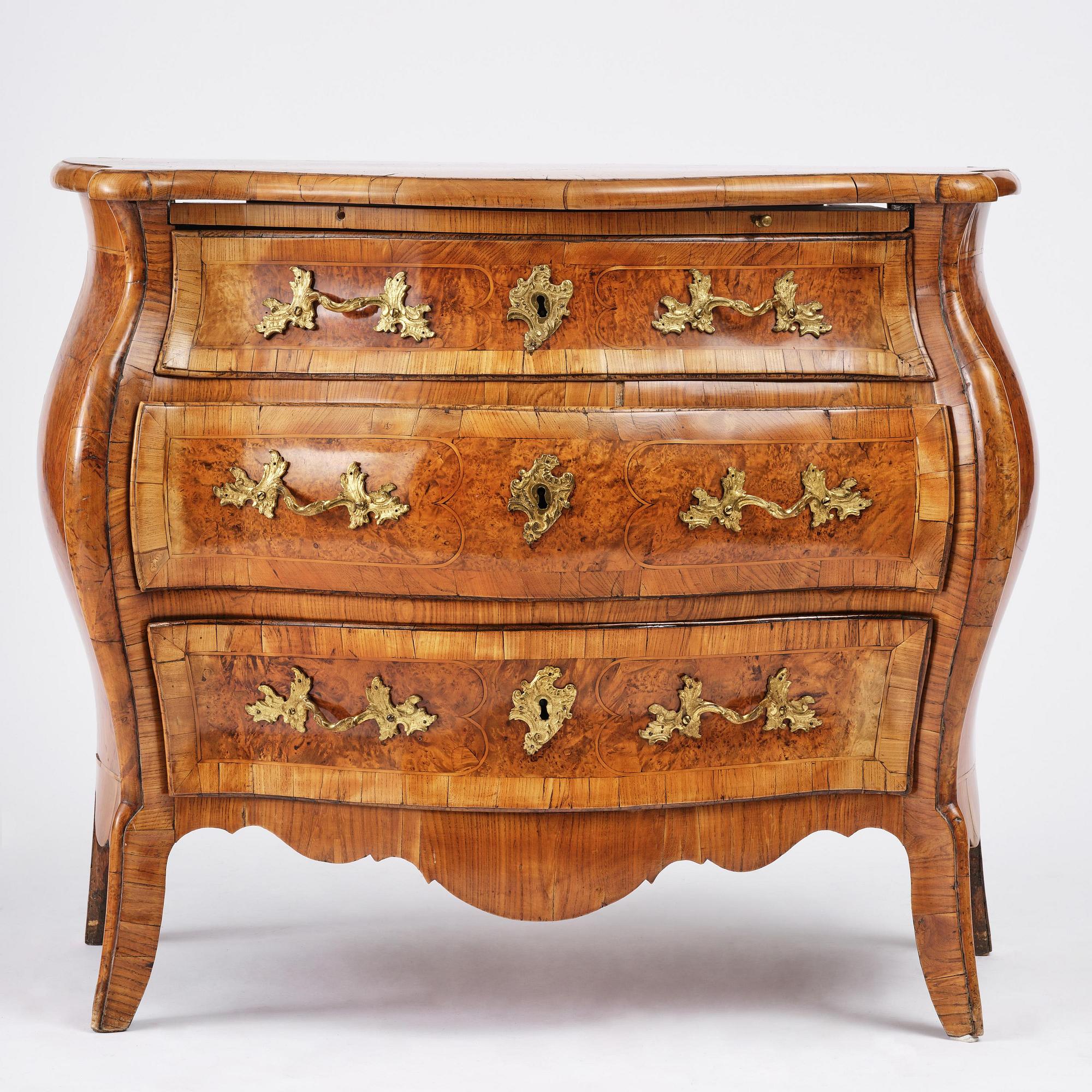 A burr alder parquetry rococo commode, Mälardalen, Sweden, later part 18th century.