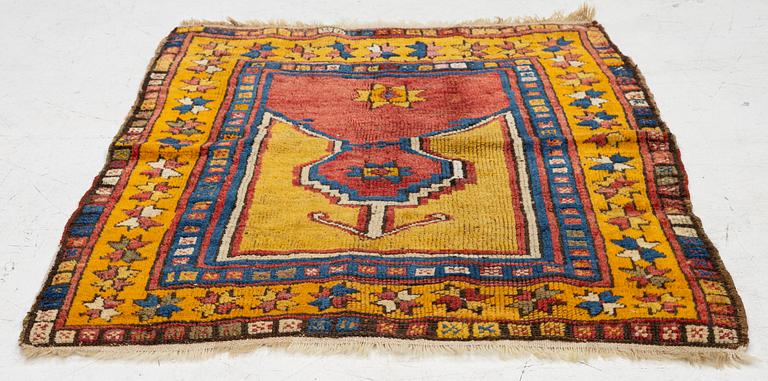 An antique prayer rug, central Anatolia, c.. 92 x 77 cm.