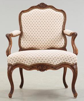 A Louis XV 18th century armchair.