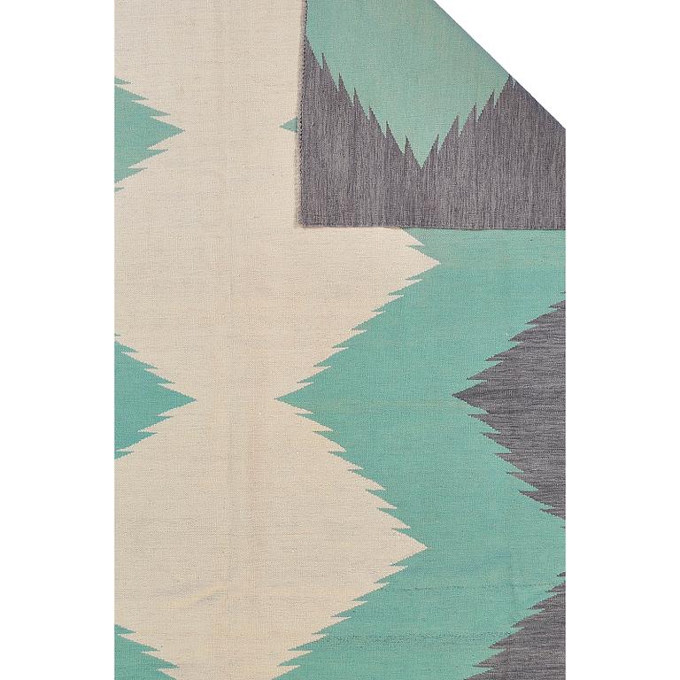 A kilim carpet, ca 303 x 250 cm.